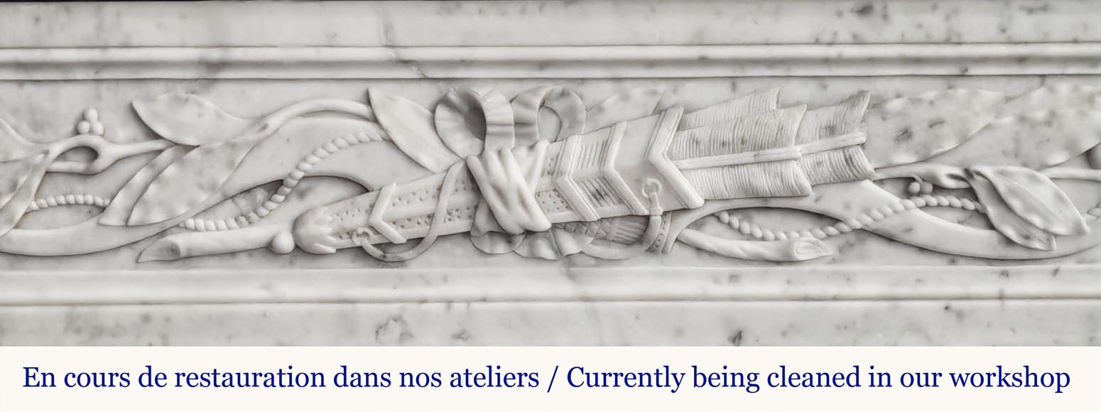 Louis XVI style fireplace in Carrara marble decorated with a bow and a quiver Louis XVI style fireplace in Carrara marble decorated with a bow and a quiver-1