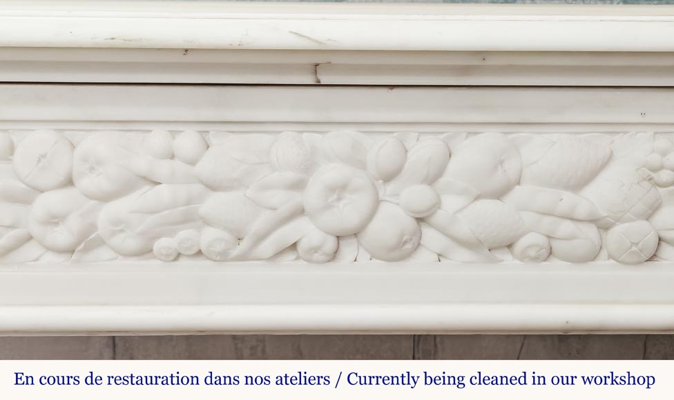 Napoleon III style fireplace in statuary marble, decorated with fruit and a goat's head Napoleon III style fireplace in statuary marble, decorated with fruit and a goat's head-1