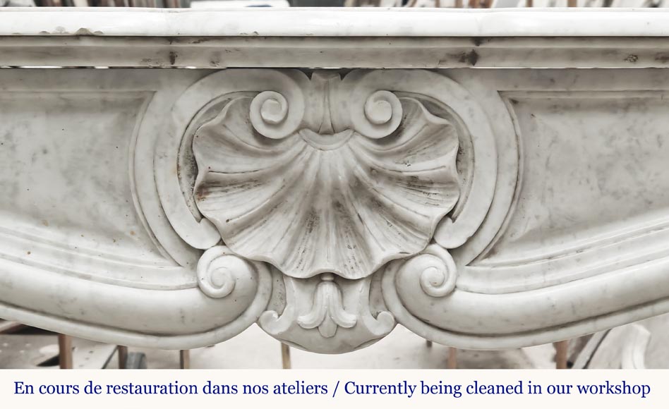 Louis XV style fireplace in Carrara marble decorated with a shell Louis XV style fireplace in Carrara marble decorated with a shell-1