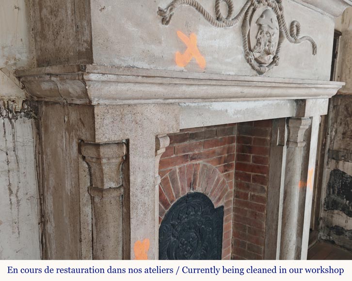 Carved stone fireplace with three-faced mask decoration Carved stone fireplace with three-faced mask decoration-2