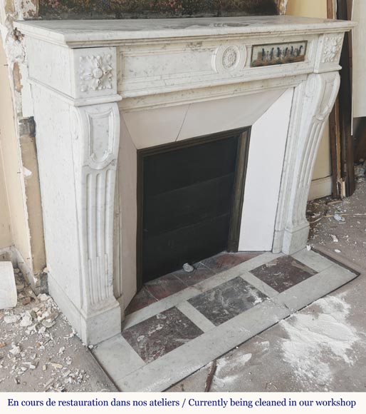 Louis XVI style fireplace in Carrara marble, decorated with a flower Louis XVI style fireplace in Carrara marble, decorated with a flower-2