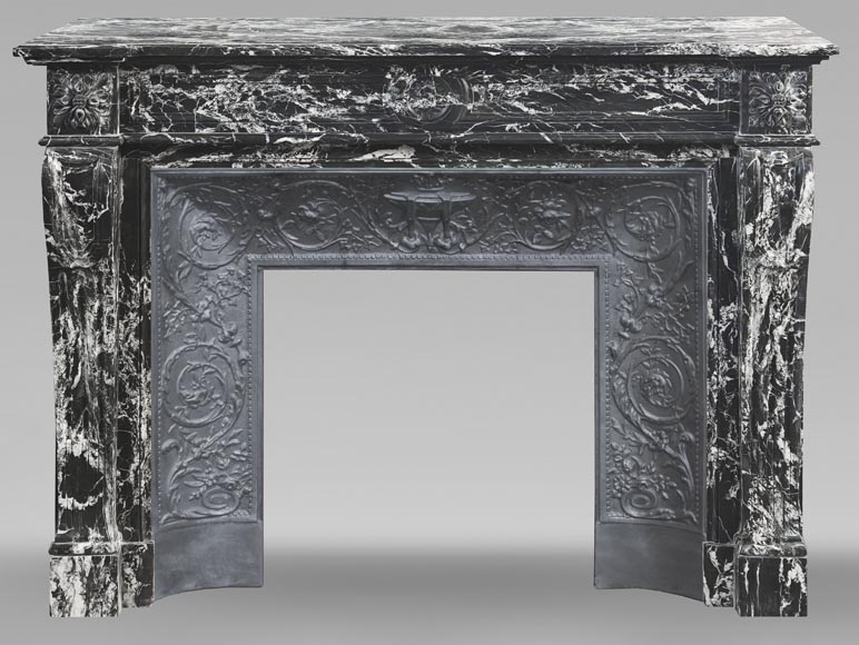 Louis XVI style fireplace decorated with a flower, in black Marquina marble Louis XVI style fireplace decorated with a flower, in black Marquina marble-0