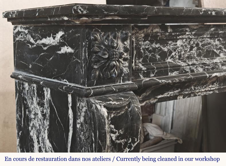 Louis XVI style fireplace decorated with a flower, in black Marquina marble Louis XVI style fireplace decorated with a flower, in black Marquina marble-4