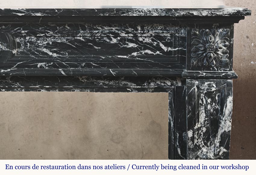 Louis XVI style fireplace decorated with a flower, in black Marquina marble Louis XVI style fireplace decorated with a flower, in black Marquina marble-7