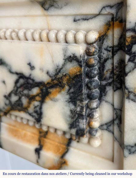 Louis XVI style fireplace in Paonazzo marble, decorated with a pearl frieze Louis XVI style fireplace in Paonazzo marble, decorated with a pearl frieze-2