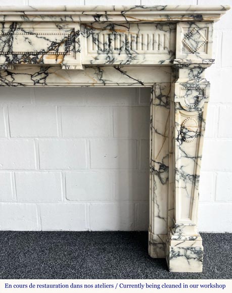 Louis XVI style fireplace in Paonazzo marble, decorated with a pearl frieze Louis XVI style fireplace in Paonazzo marble, decorated with a pearl frieze-7