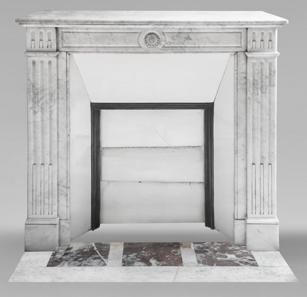 Louis XVI style fireplace in Carrara marble, decorated with a sunflower Louis XVI style fireplace in Carrara marble, decorated with a sunflower-0