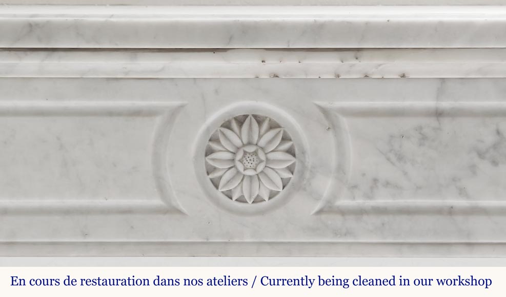 Louis XVI style fireplace in Carrara marble, decorated with a sunflower Louis XVI style fireplace in Carrara marble, decorated with a sunflower-1