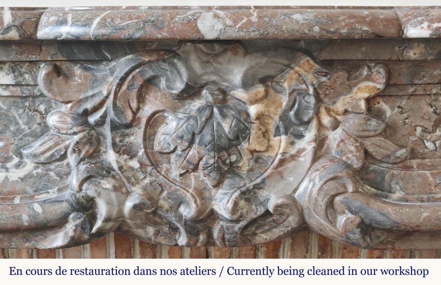 Louis XV period fireplace in Rouge Royal marble, decorated with a shell Louis XV period fireplace in Rouge Royal marble, decorated with a shell-1