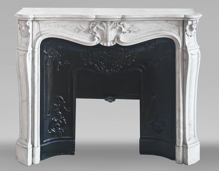 Louis XV style fireplace in Carrara marble decorated with a palmette Louis XV style fireplace in Carrara marble decorated with a palmette-0