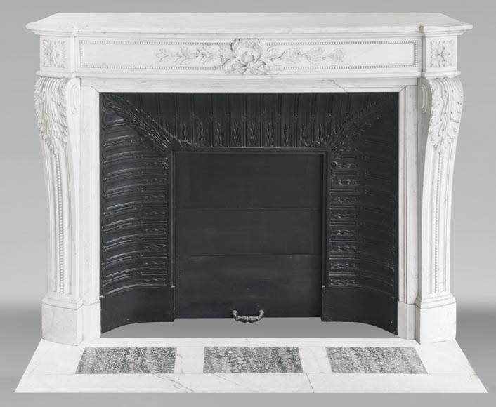 Curved Louis XVI style fireplace with beaded decoration, in semi-statuary marble. Curved Louis XVI style fireplace with beaded decoration, in semi-statuary marble.-0