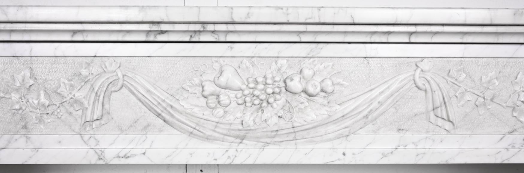 Louis XVI period fireplace with carved fruit decoration, in veined Carrara marble Louis XVI period fireplace with carved fruit decoration, in veined Carrara marble-1