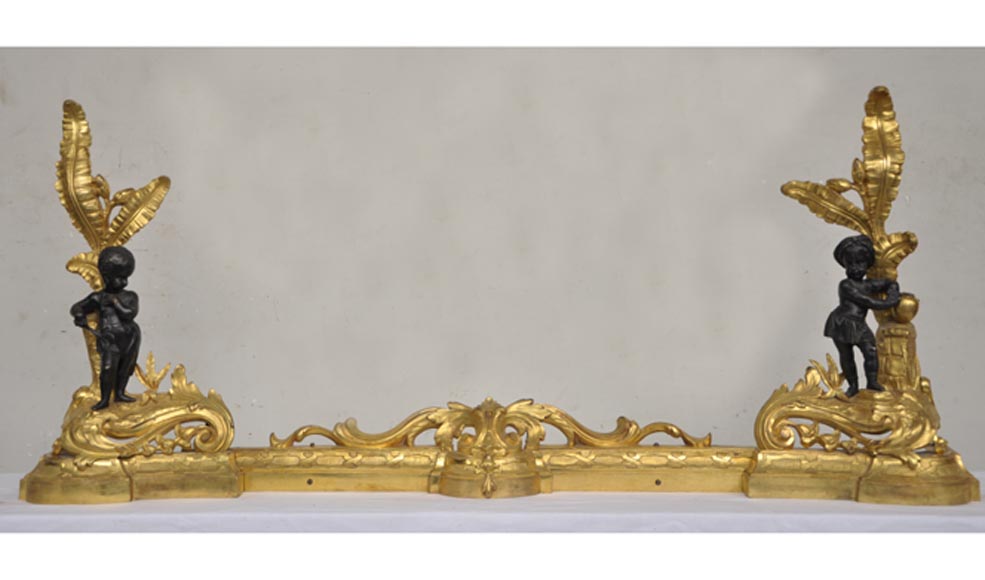 Antique bronze firedog with exotic figures. Antique bronze firedog with exotic figures.-0