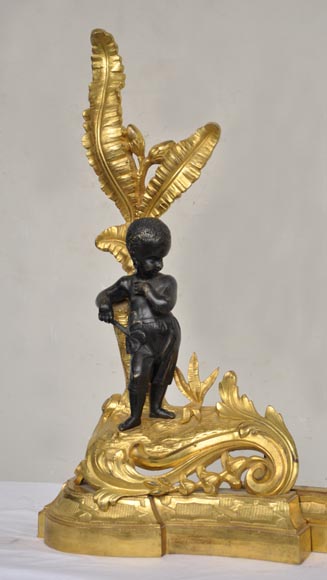 Antique bronze firedog with exotic figures. Antique bronze firedog with exotic figures.-1