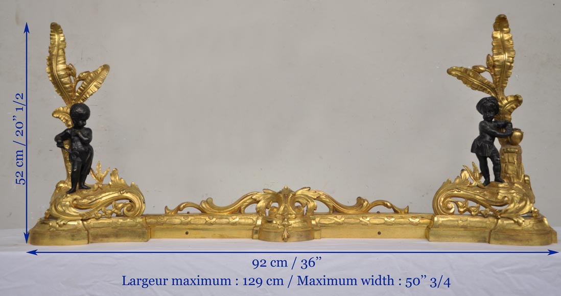 Antique bronze firedog with exotic figures. Antique bronze firedog with exotic figures.-9