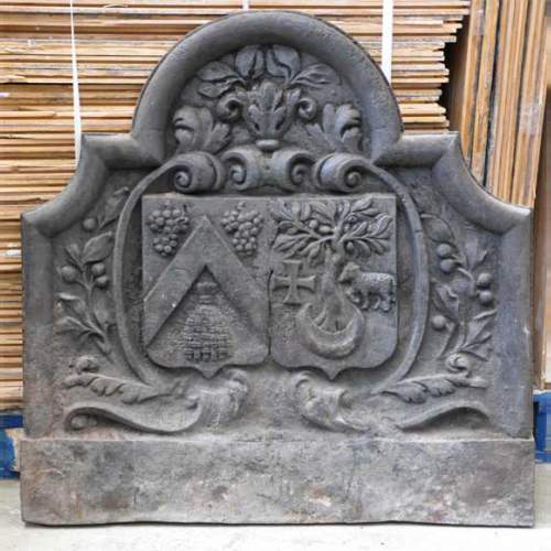 Antique cast iron fireback with two coat of arms