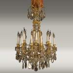 Large bronze and cristal chandelier with tassels