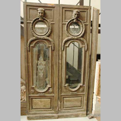 Monumental double door with fantastic decor