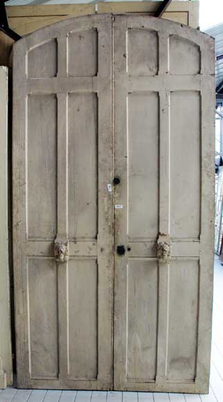 Narrow wooden double door.-0