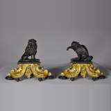 Antique pair of gilded bronze and brown patina bronze andirons with cat and dog decor