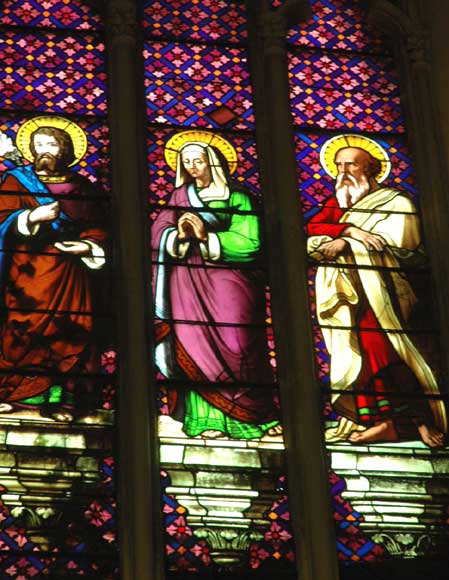 Stained glass window from a chapel with Saint Anne as central figure -1