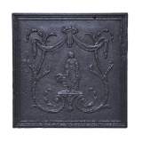 Antique cast iron fireback with peasant woman decor