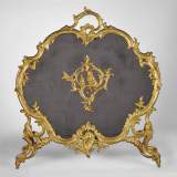 Antique Louis XV style gilt bronze fire screen with a Winter Allegory