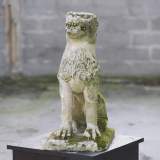Lion, antique stone garden statue from the 17th century