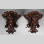 Pair of applied consoles in carved walnut with putti decor, Napoleon 3 period