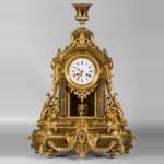 Important Louis XVI style gilt bronze clock with solar mask, Napoleon 3 period