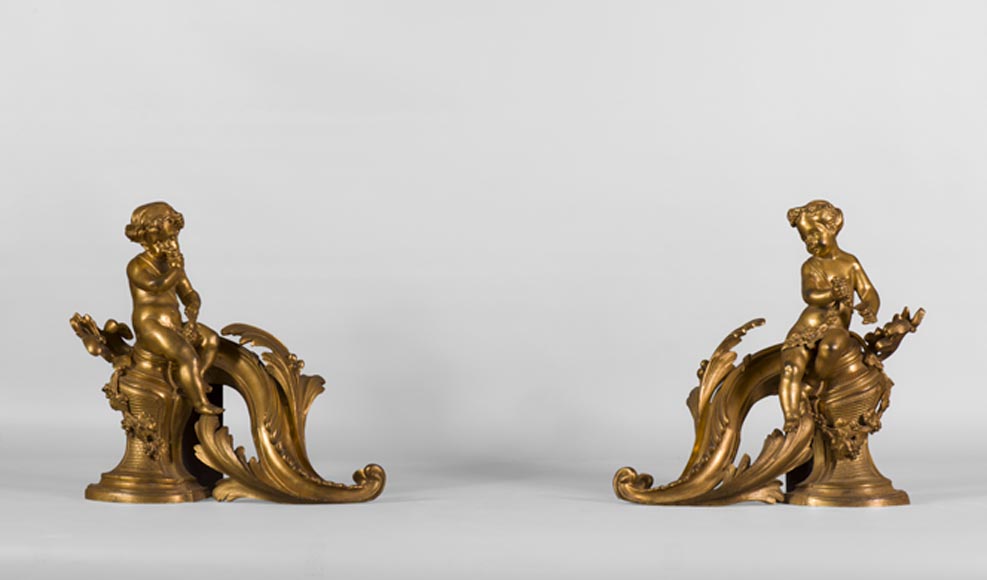 Pair of Louis XV style andirons in gilded bronze decorated with children in vineyards-0