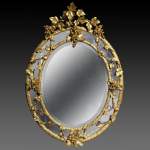 Very beautiful antique Napoleon III oval mirror decorated with bunches of grapes and grape leaves