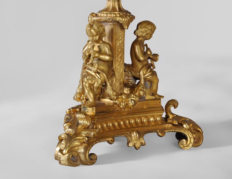 Gilt bronze 19th-century Romantic clock set with the Four Seasons