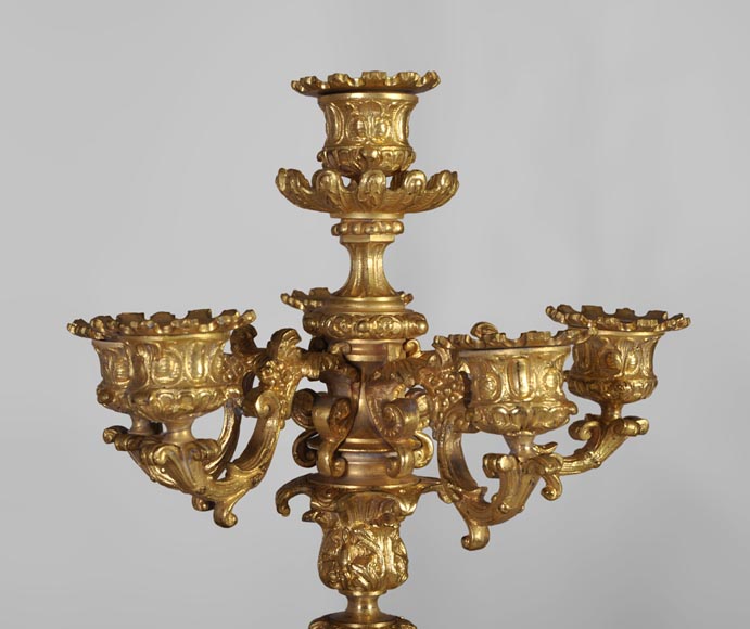 Gilt bronze 19th-century Romantic clock set with the Four Seasons