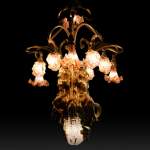 Beautiful antique Art Nouveau style chandelier in gilt bronze and molded glass with languid bodies and nine lights