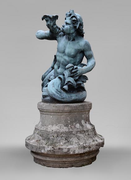 Important Louis XIV style pair of Tritons sounding a conch shell in bronze with green patina