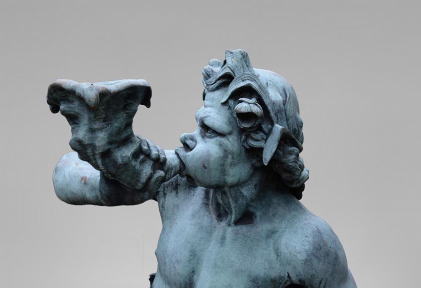 Important Louis XIV style pair of Tritons sounding a conch shell in bronze with green patina