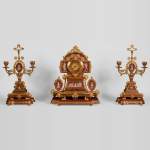 Neo-Pompeian style clock set made out of gilded bronze and red ceramic