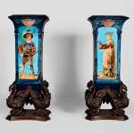 Pair of Neo-Renaissance style earthenware cones vases with brown patina bronze griffins