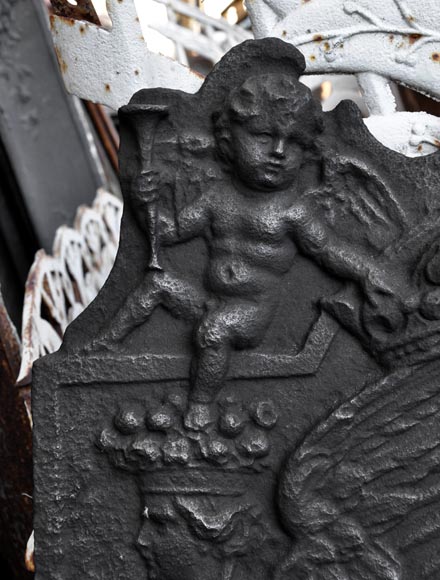 Antique fireback with French coat of arms and rich decor with cupids, 17th century-3