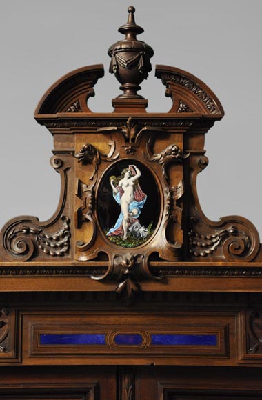 Two-body cabinet, in th Neo-Renaissance style, in carved walnut with enamel and lapis-lazuli inlays-1