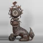 Chinese style clock with Foo dog decoration.