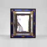 Beautiful beveled mirror in gilt bronze and blue glass