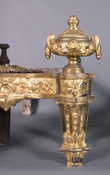 Beautiful pair of antique Louis XVI style andirons in gilt bronze from the 19th century decorated with vases and floral garlands-4