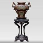 Capitain-Gény foundry, Bronze burnished cast iron vase on a tripod, circa 1892