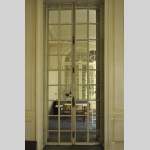 Three pairs of interior shutters made of metal with mirrors