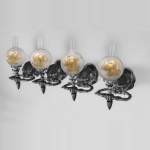 Suite of four Napoleon III period sconces with bronze panther head