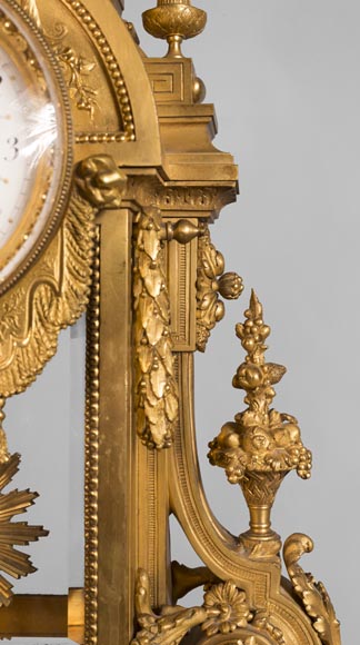 Louis XVI style clock, in gilded bronze-5