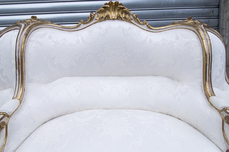 A large Louis XV style bench made out of gilded wood-10