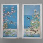 A pair of ceramic panels with birds in a lacustrine scenery signed 
